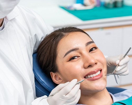 Woman smiling at the dentist