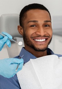 Man smiling in dental chair